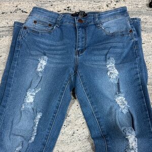 Distressed Fashion Nova Skinny Blue Jeans